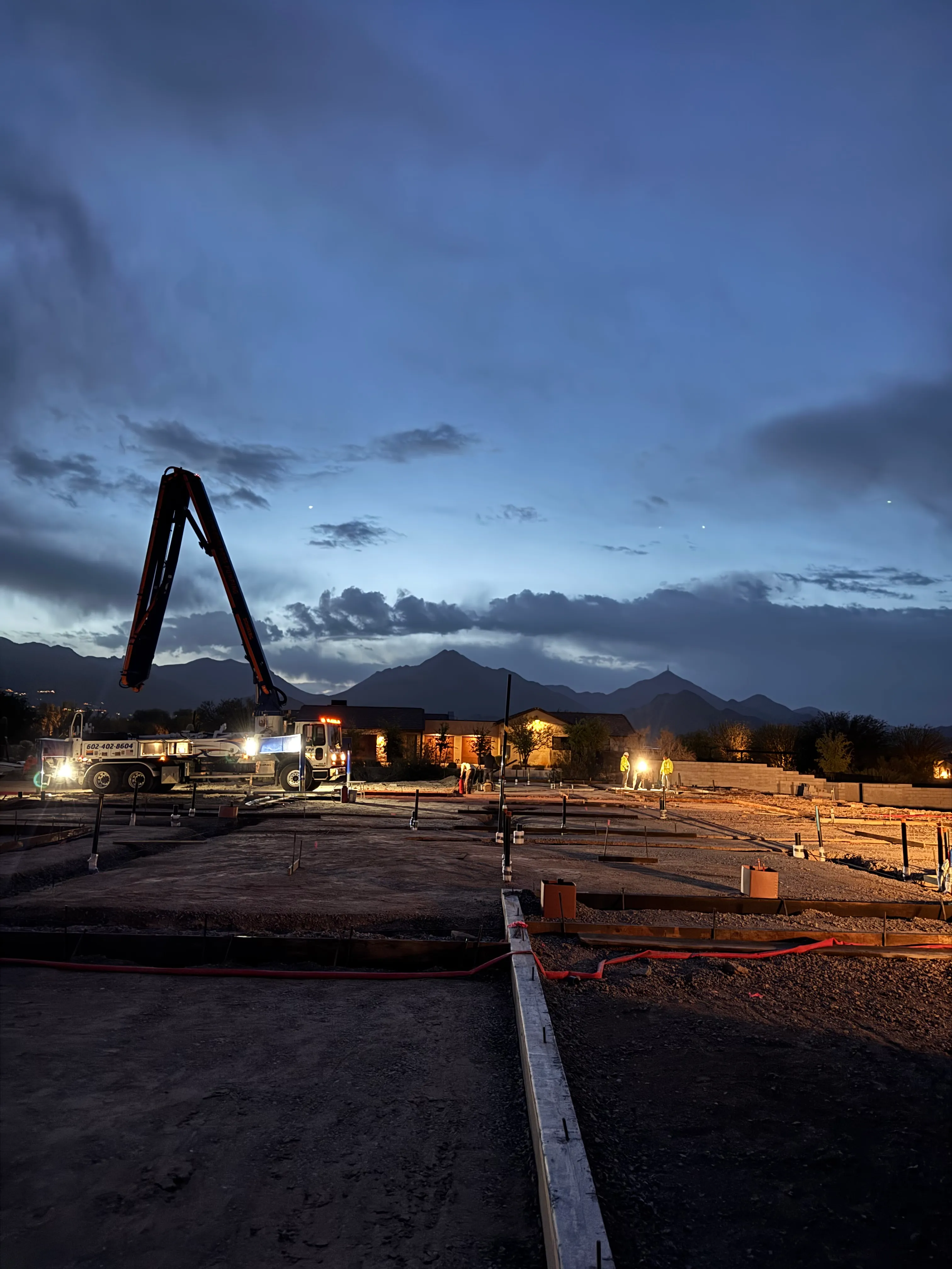 Night concrete pour with pump truck
